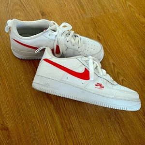 White and Red Air Force 1’s.